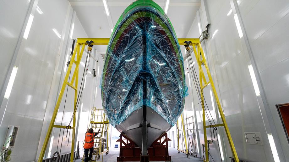 A freshly painted Shannon class lifeboat, in a white spray booth 
