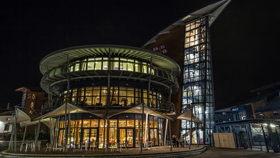 The RNLI College, lit up at night