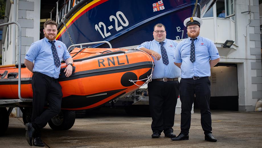 Ciarán, Nathan and Lochlainn Leneghan stand proudly with their station’s D class and Mersey class lifeboats. 