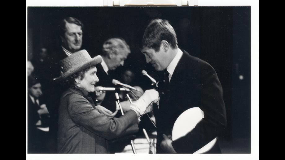 Coxswain Michael Scales receiving gold medal