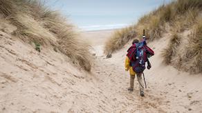 A walker on Aberavon Beach
