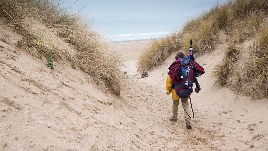 A walker on Aberavon Beach