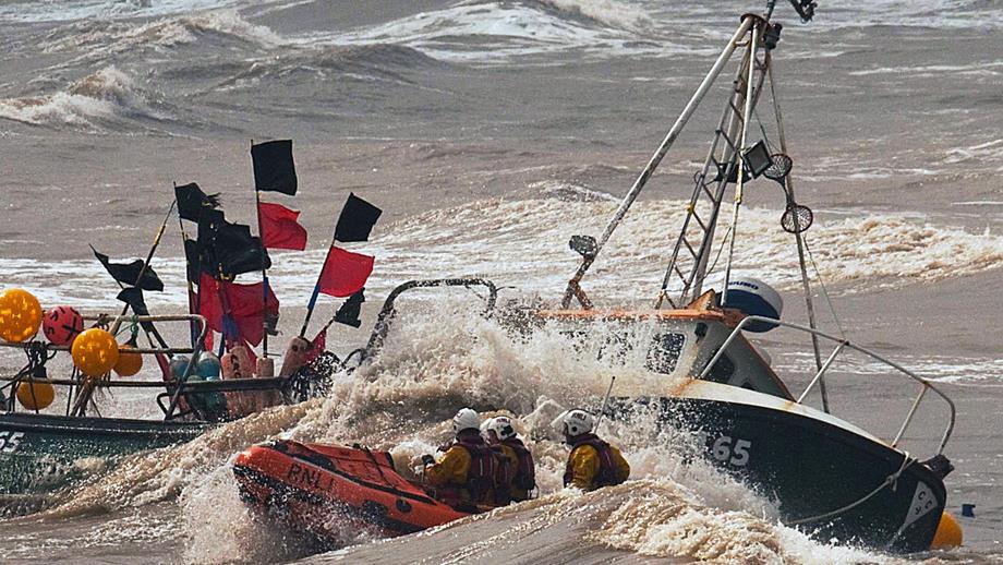 Bridlington lifeboat crew rescue four fisherman from their sinking boat