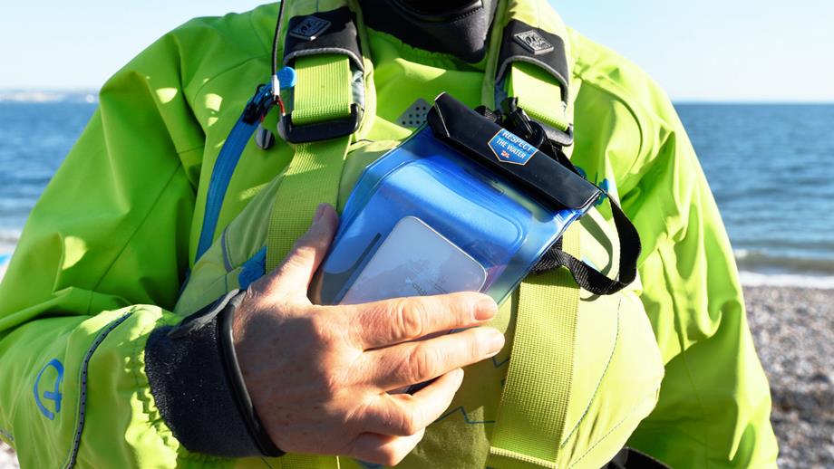 Kayaker carrying a mobile phone in a pouch
