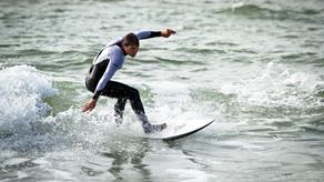 Surfer at Boscombe Beach, Bournemouth