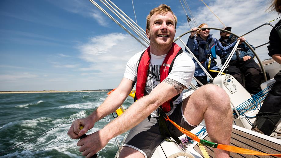 Yacht sailing: Crew enjoying being out on the water  