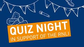 A banner that reads ‘quiz night in support of the RNLI'