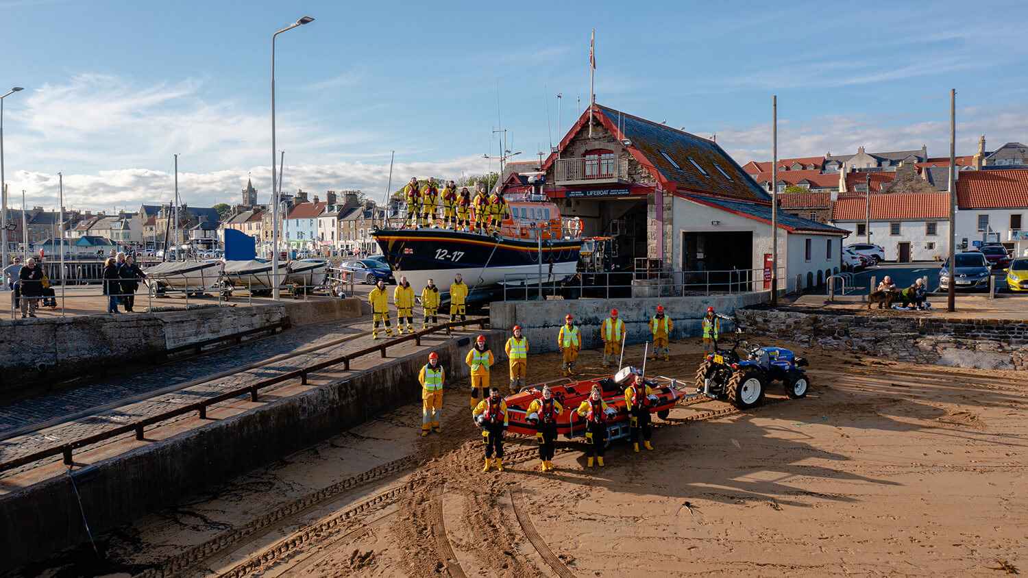 Anstruther lifeboat station with full crew outside 