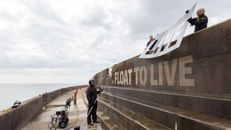 Float to Live message written on stone - Kärcher helped to share our lifesaving messaging in Brighton