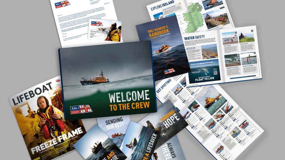 Top down view of the complete printed membership welcome pack.