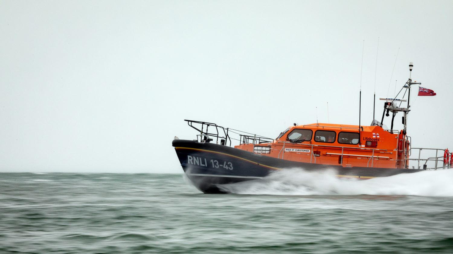 Clifden Shannon class lifeboat St Christopher 13-43 moving quickly through the waves.