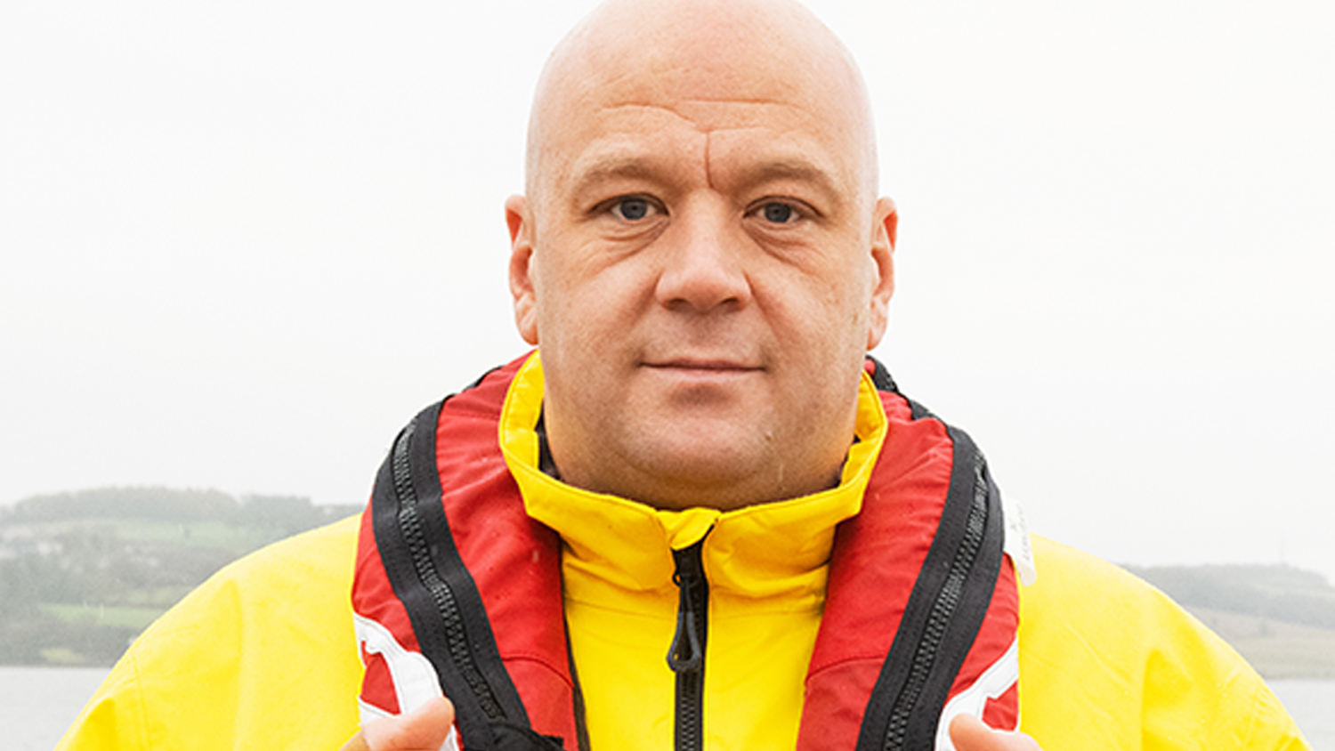 A portrait of Benny Thomson, Volunteer Crew Member at Broughty Ferry RNLI. He is wearing crew kit.
