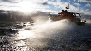 RNLI Severn Lifeboat with white horses blue skies and sunny weather