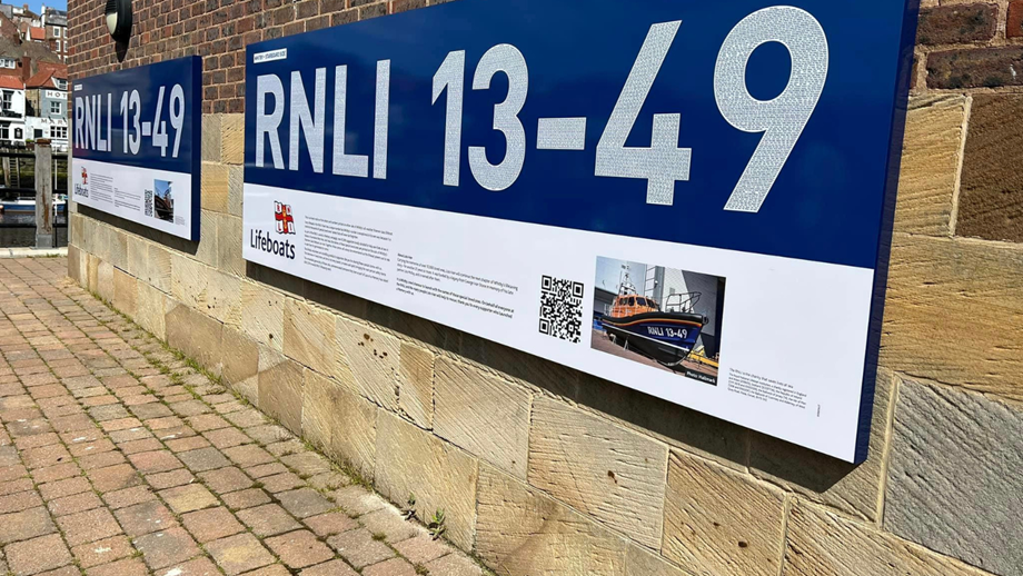 An image of the new signage displaying a replica of the Whitby lifeboat decal
