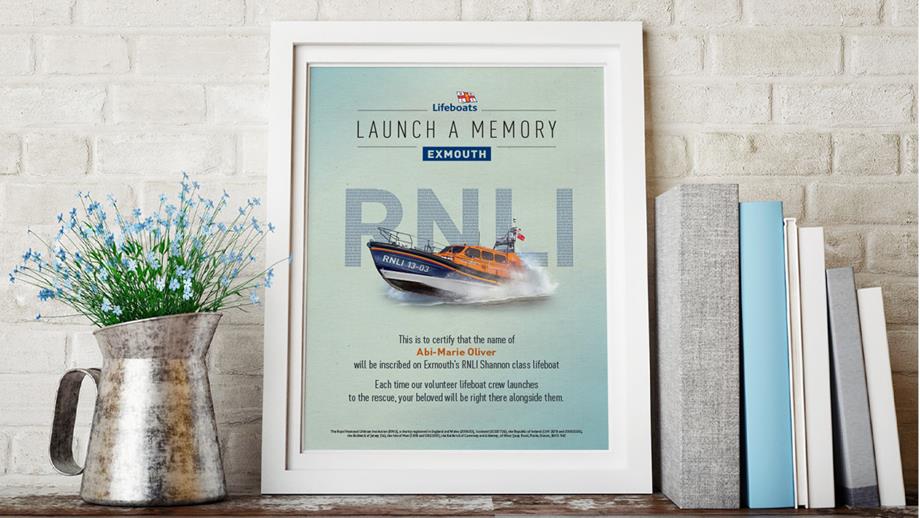 Framed Launch a Memory certificate on a shelf.