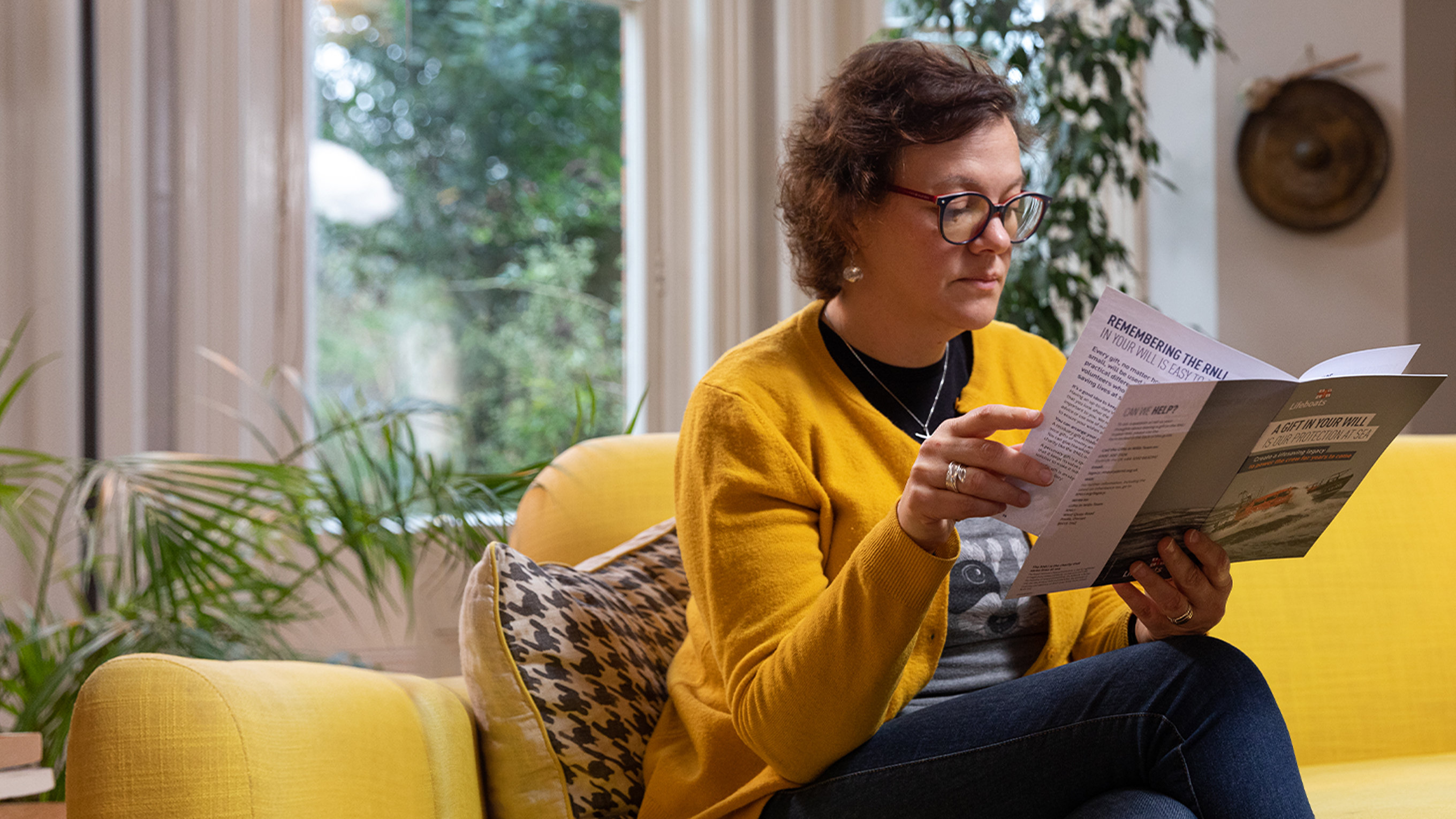 Lady reading gift in wills pack