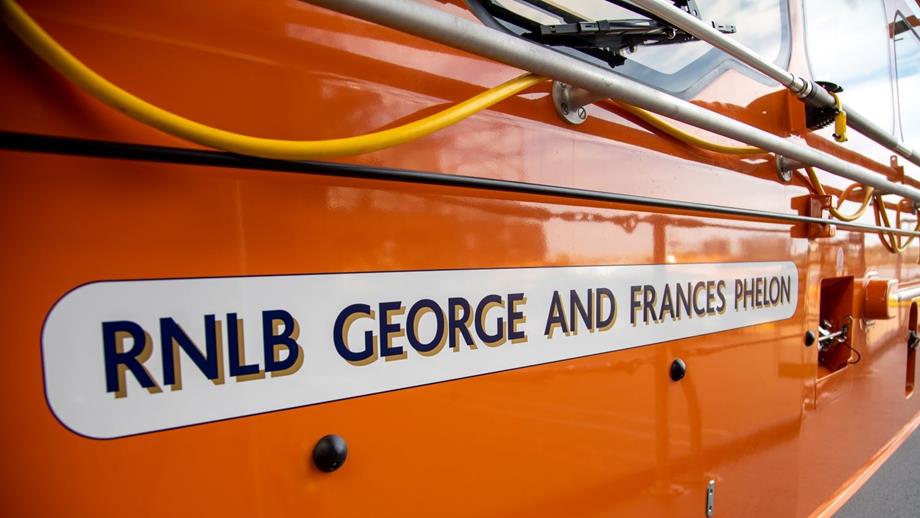 Decal with legacy names on being applied to the Great Yarmouth and Gorleston Shannon class lifeboat George and Francis Phelon 13-44 a the Al-Weather Lifeboat Centre (ALC) in Poole.