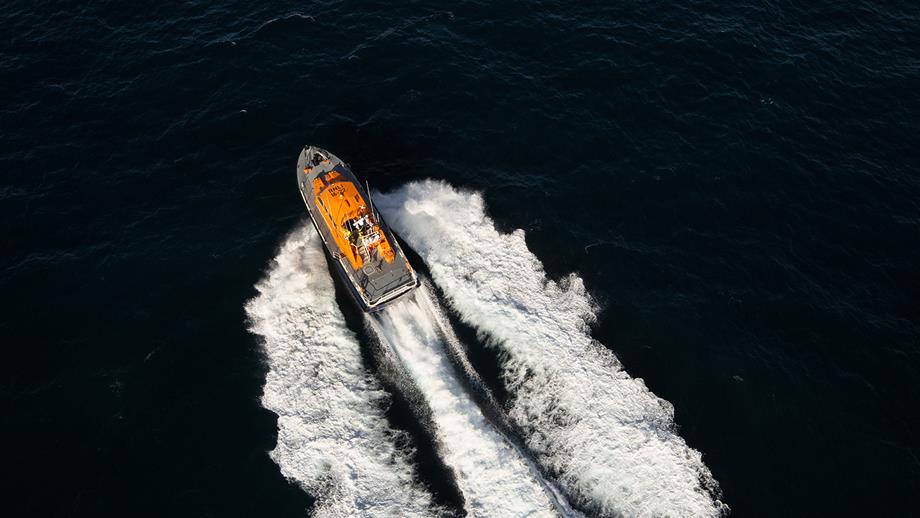 An aerial photograph of Baltimore’s Tamar class lifeboat, powering out to sea