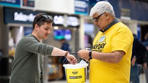 RNLI fundraising volunteer Suresh Bharwaney collecting at Waterloo train station.