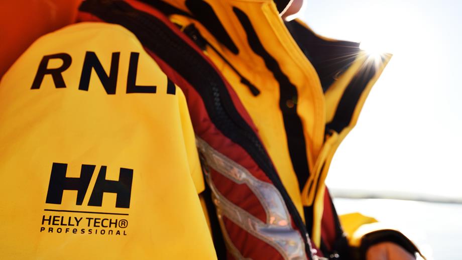 Close up shot of RNLI kit with Helly Hansen logo on sleeve