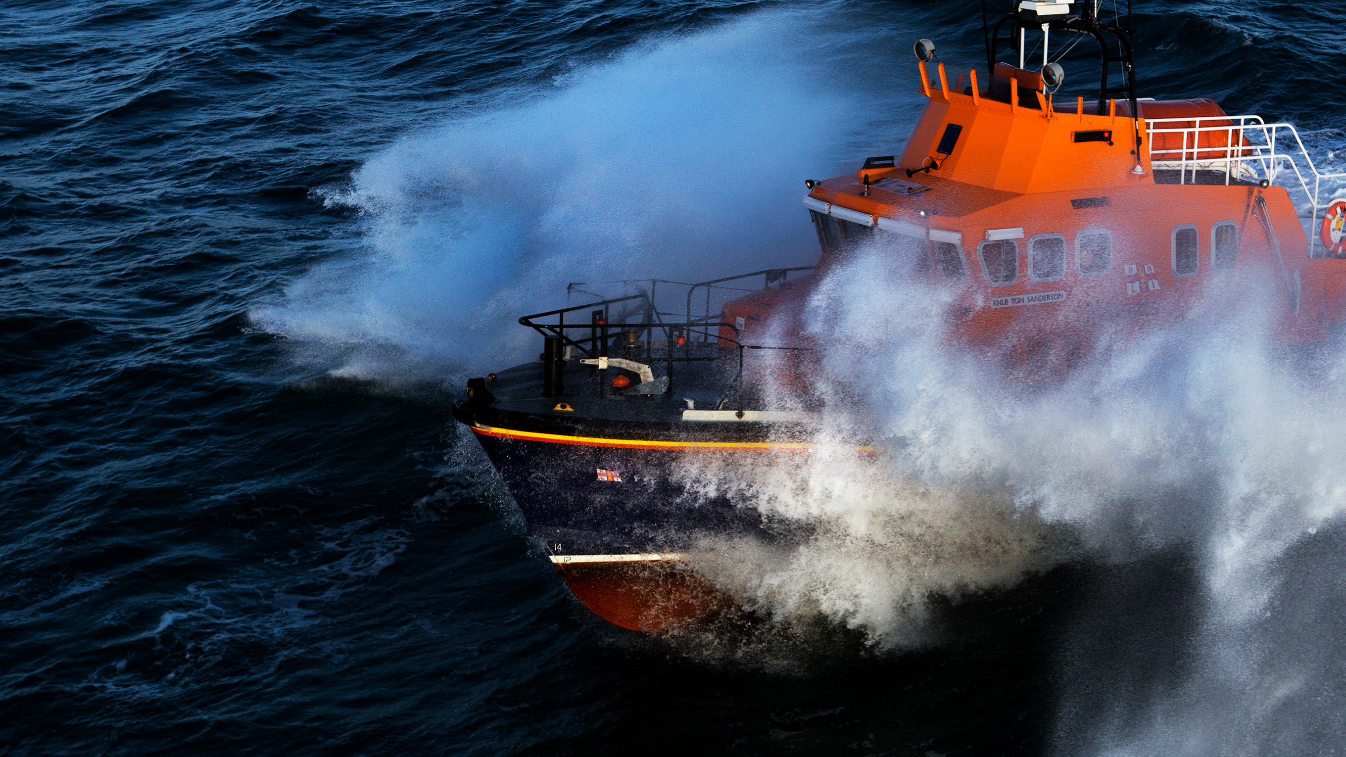 A Severn class lifeboat crashing through the waves.