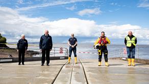 A group of volunteers in different roles