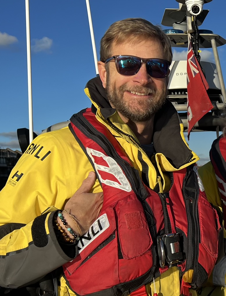 Portrait of Christopher Averill in RNLI kit