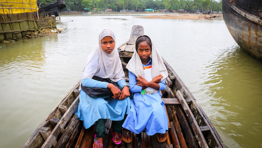 Girls travelling to school by boat in Bangladesh