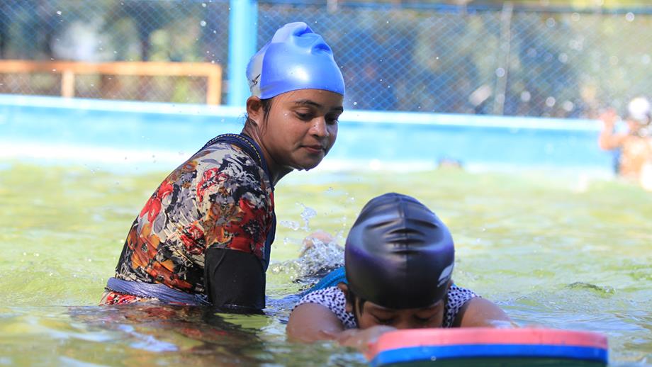 Jeny teaching a SwimSafe lesson in a temporary pool in Cox’s Bazaar, Bangladesh