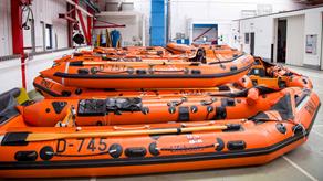 Recently built D class lifeboat RIBs on the floor of the Inshore Lifeboat Centre
