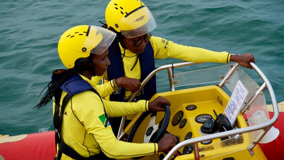 Two Tanzania Sea Rescue volunteers training on their lifeboat