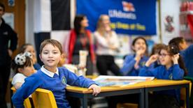 Young boy in primary school class